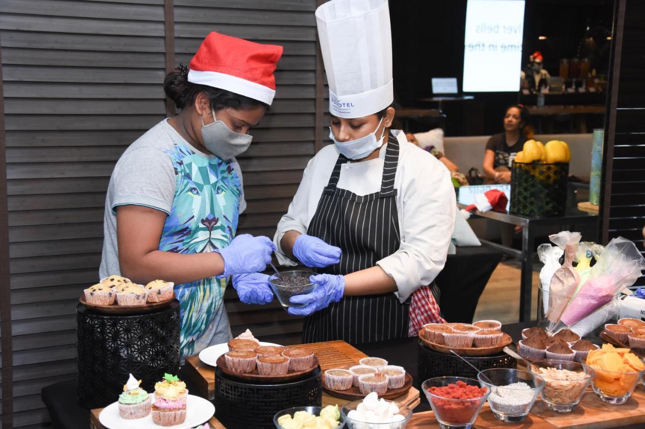 Novotel Chennai Chamiers Road Exterior photo A chef at work