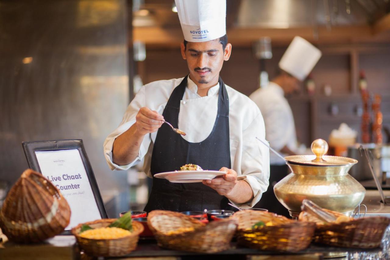 Novotel Chennai Chamiers Road Exterior photo A chef at work