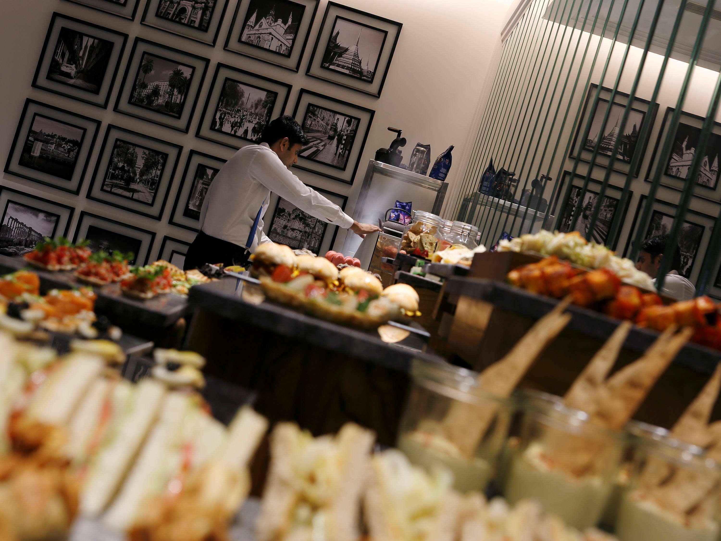 Novotel Chennai Chamiers Road Exterior photo A buffet at a hotel