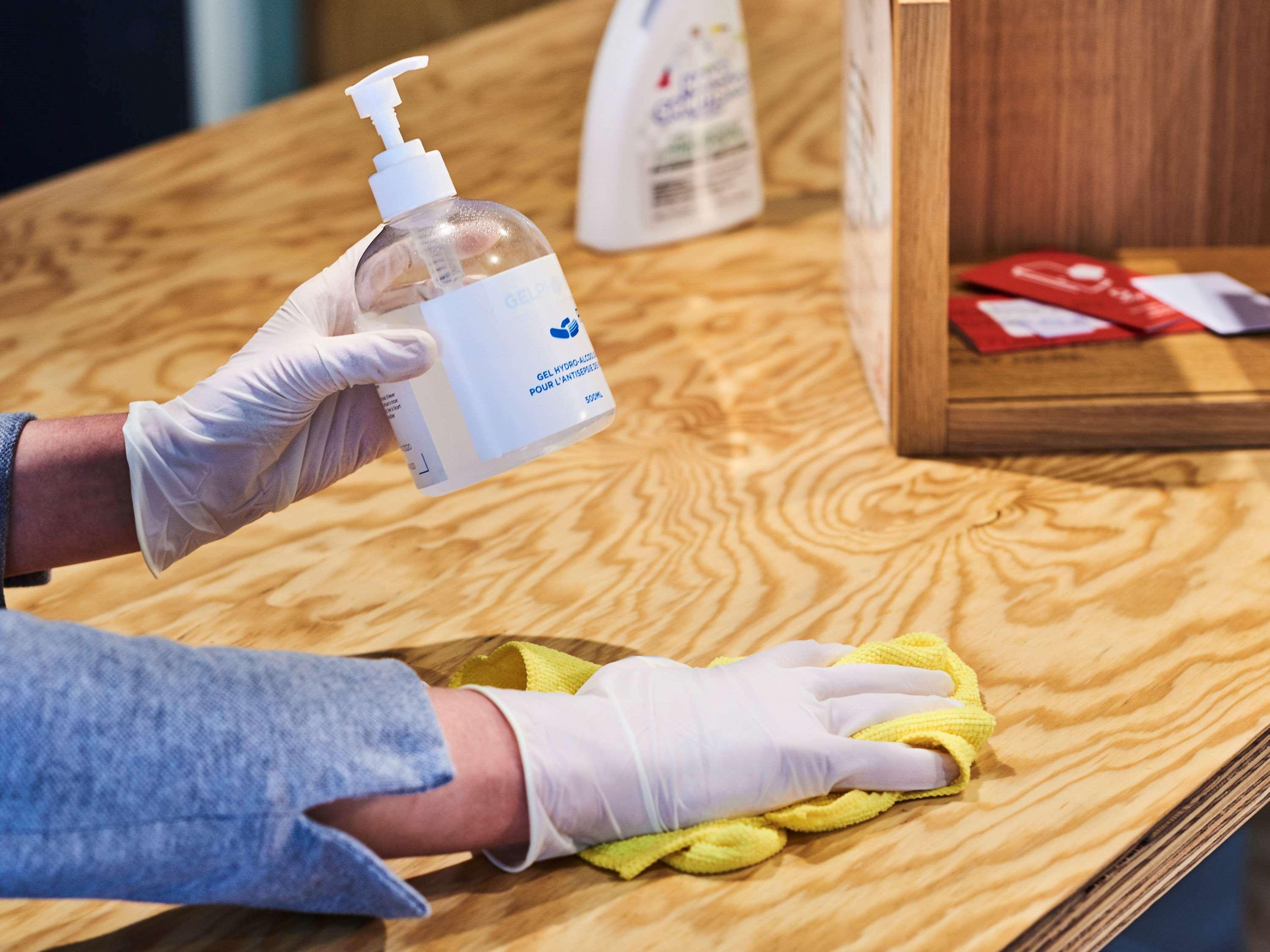 Novotel Chennai Chamiers Road Exterior photo Disinfection of a table with a disinfectant