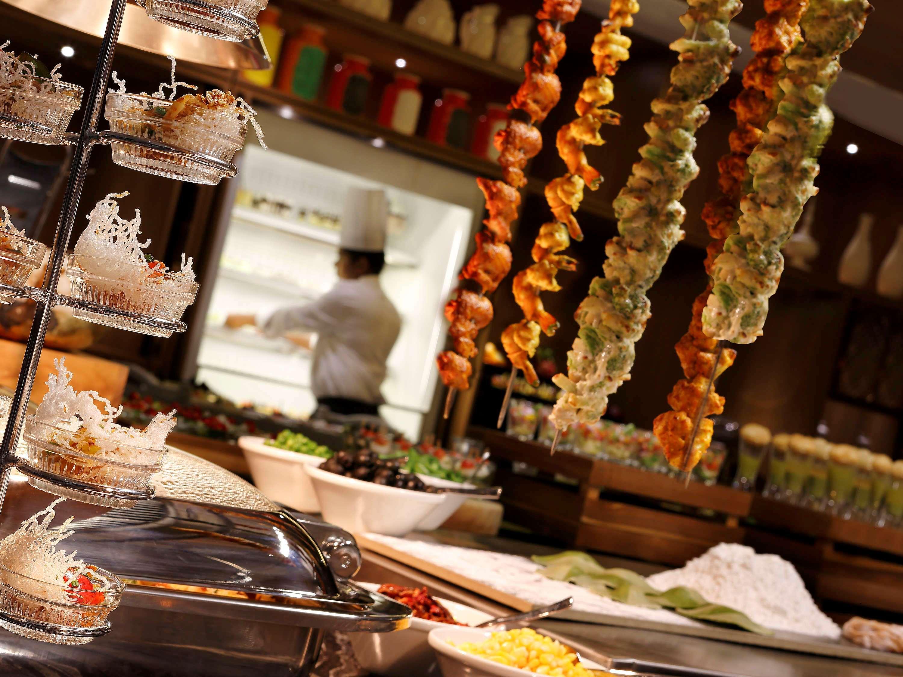 Novotel Chennai Chamiers Road Exterior photo Indian cuisine