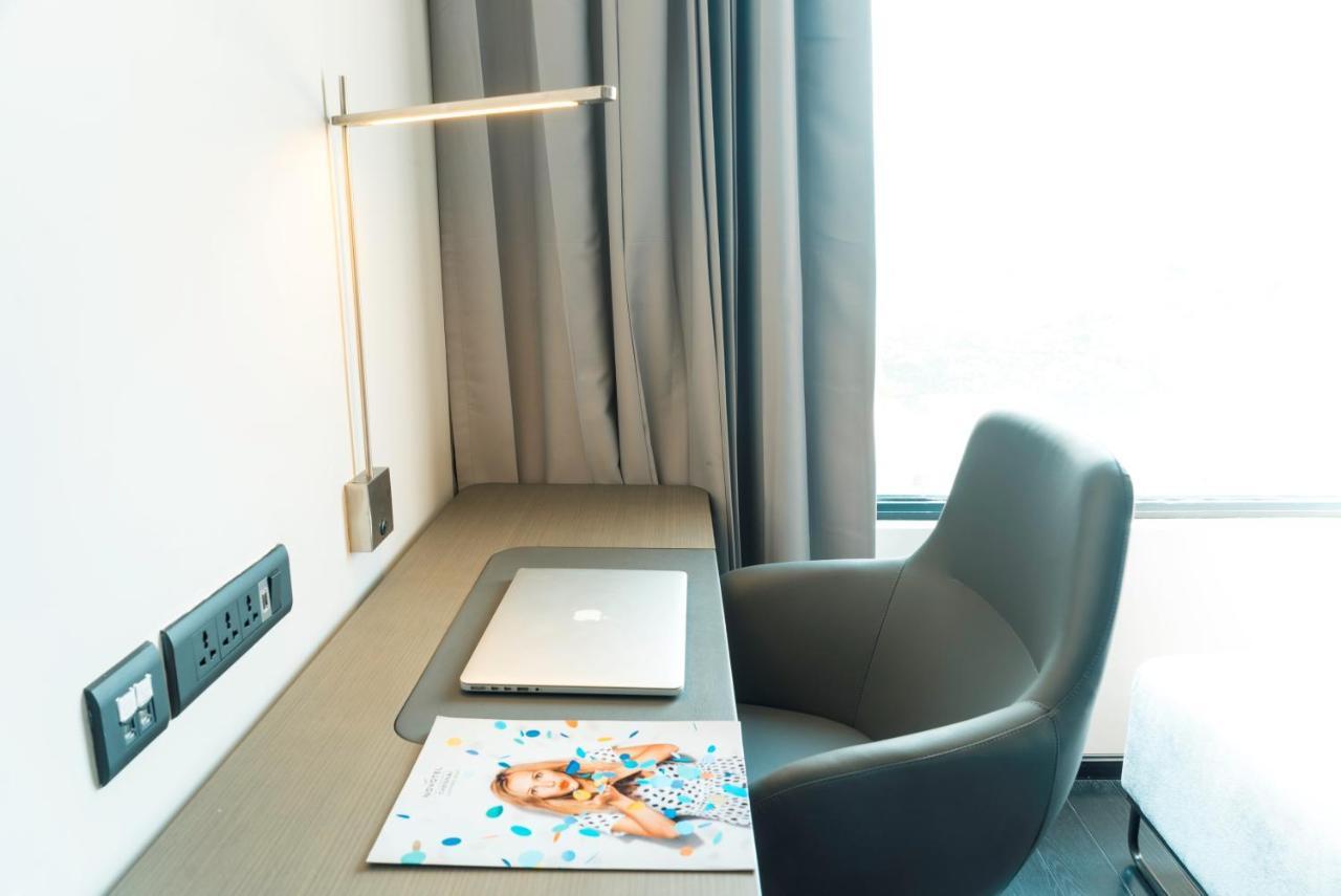 Novotel Chennai Chamiers Road Exterior photo A wall-mounted linear light